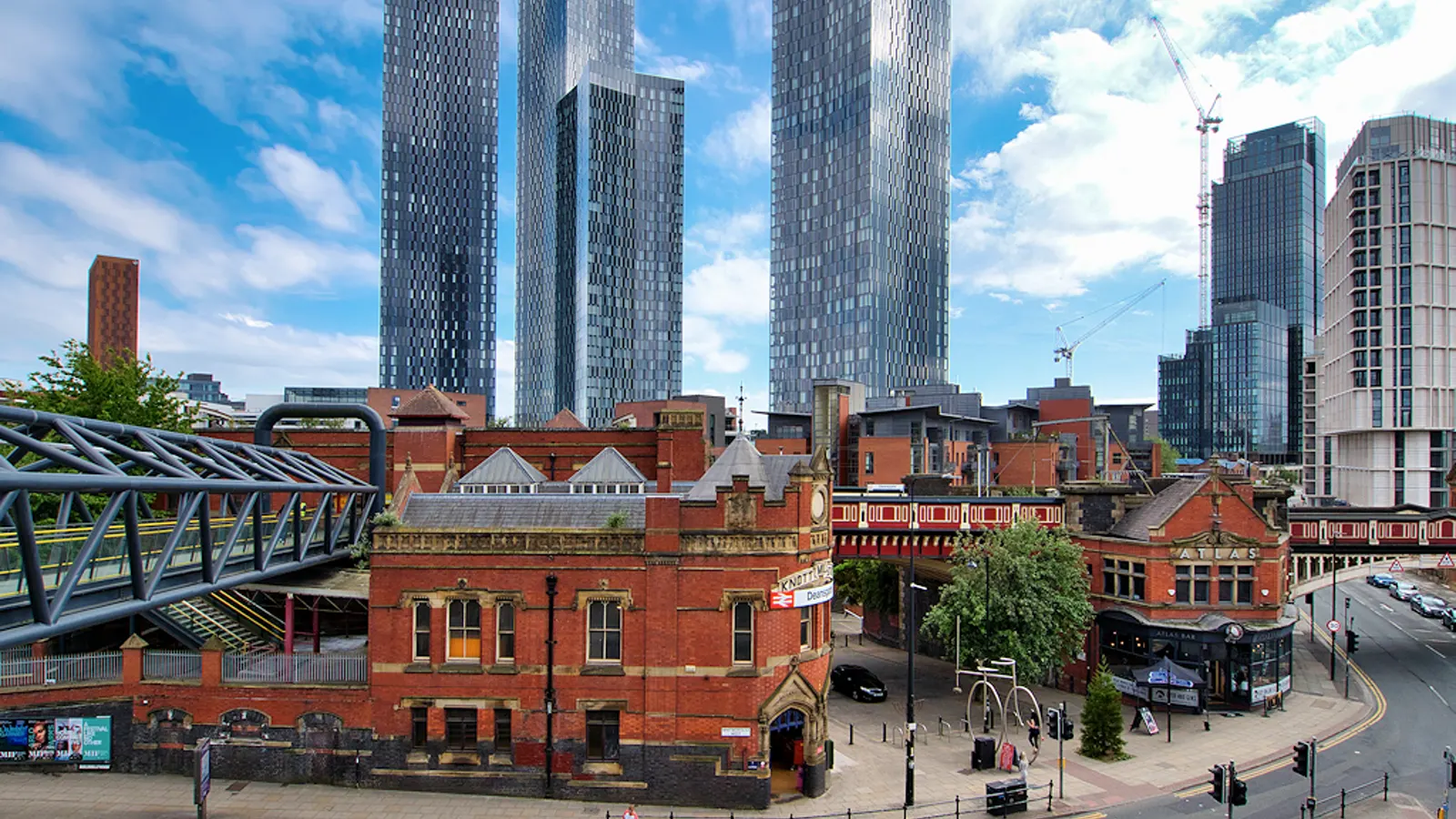 Workwear printing in Manchester, Greater Manchester Embroidery for businesses in Manchester — View over Manchester, Greater Manchester — the area Net-workwear supplies with branded workwear and embroidered uniforms